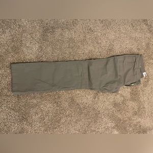 Slightly worn mountain khakis.